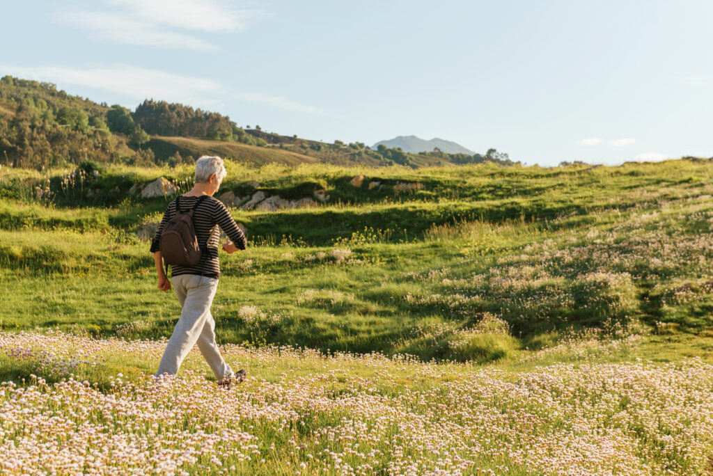 Woman walking in nature symbolizing peace for estranged parents